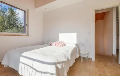 Letto o letti in una camera di Nice Home In San Salvatore With Wifi