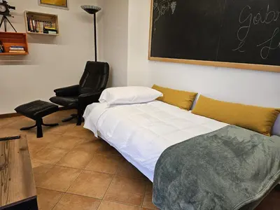 Letto o letti in una camera di La Vite in Collina Apartment