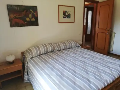Letto o letti in una camera di Il Melograno
