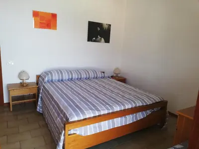 Letto o letti in una camera di Il Melograno