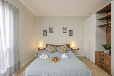 Letto o letti in una camera di Italian Experience- Lory House
