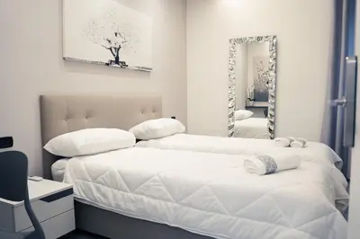 Letto o letti in una camera di House 21 Residence Room