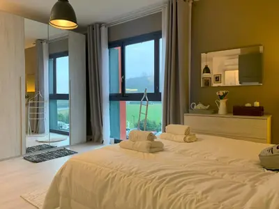 Letto o letti in una camera di Parma Business Apartment