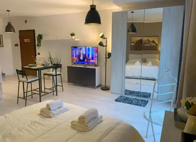 Letto o letti in una camera di Parma Business Apartment