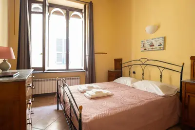 Letto o letti in una camera di Levanto Charme apartment up to 6ppl 20 steps to the water in the center