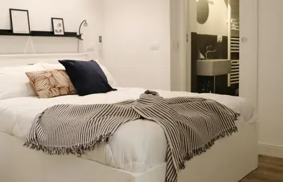 Letto o letti in una camera di Zeste Apartment in centro città con suite privata