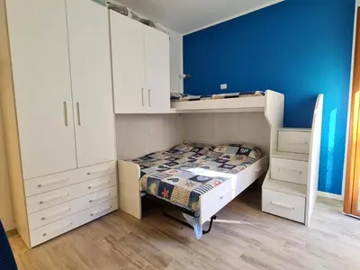 Letto o letti in una camera di Stella del Golfo