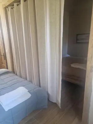 Letto o letti in una camera di Sentinella dei castagni