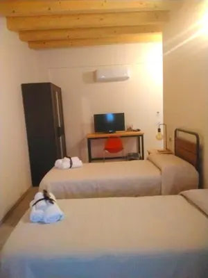 Letto o letti in una camera di Coliving Giulia