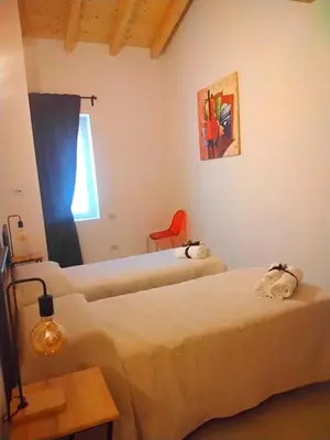 Letto o letti in una camera di Coliving Giulia