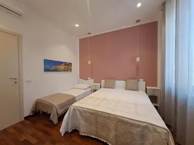 Letto o letti in una camera di Nica