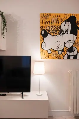 TV o dispositivi per l'intrattenimento presso Molinari House Perla - Suite moderna in centro Modena - Free ZTL