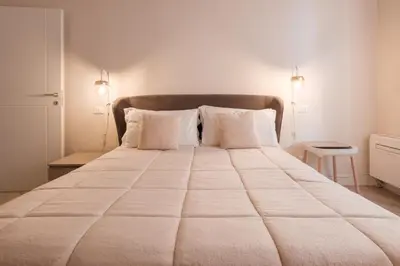 Letto o letti in una camera di Molinari House Perla - Suite moderna in centro Modena - Free ZTL
