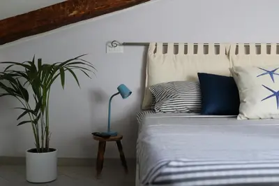 Letto o letti in una camera di Loft Apartment
