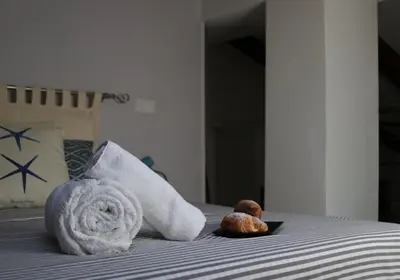 Letto o letti in una camera di Loft Apartment