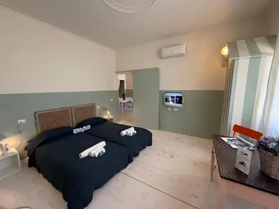 Letto o letti in una camera di House Farorosmarino by Holiday World