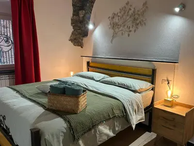 Letto o letti in una camera di Gassa d'Amante