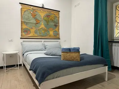 Letto o letti in una camera di Gassa d'Amante