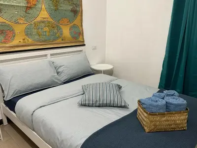 Letto o letti in una camera di Gassa d'Amante