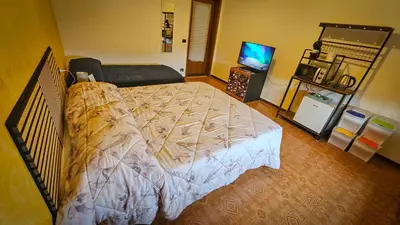 Letto o letti in una camera di Tiriticco B&B