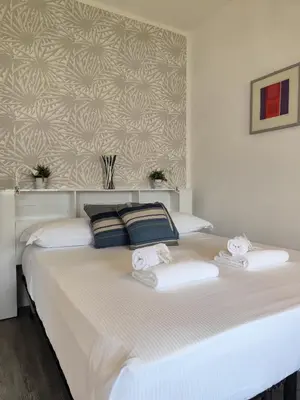 Letto o letti in una camera di JOIVY Charming Central Studio in the Heart of Rapallo