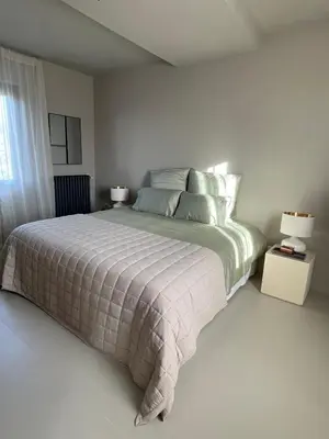 Letto o letti in una camera di Villa Eleonora Italia