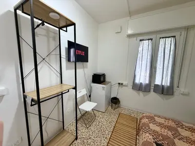 Letto o letti in una camera di Netflix - Vicino al Centro - Via Rometta Suite
