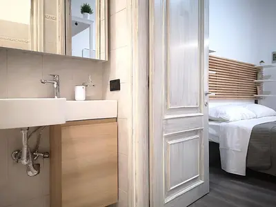 Letto o letti in una camera di Cantiere Home