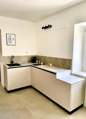 Cucina o angolo cottura di Via Alla Spiaggia