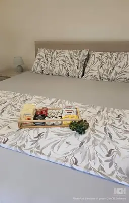 Letto o letti in una camera di Appartamento Granella