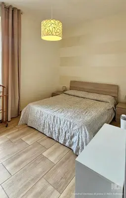 Letto o letti in una camera di Appartamento Granella