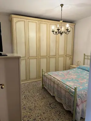 Letto o letti in una camera di LevantoTwo bedrooms Flat with terrace