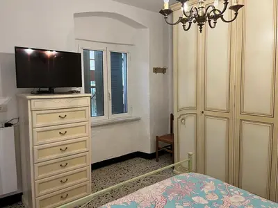 Letto o letti in una camera di LevantoTwo bedrooms Flat with terrace