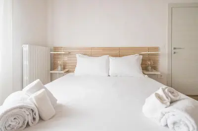 Letto o letti in una camera di Mansarda del Duca