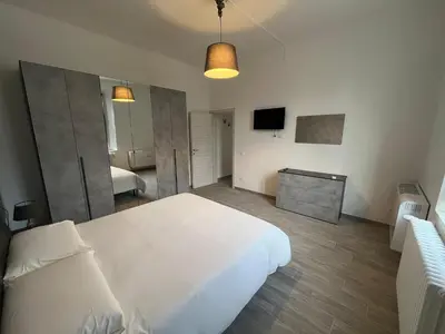 Letto o letti in una camera di Suite Storchi - Apartment near downtown