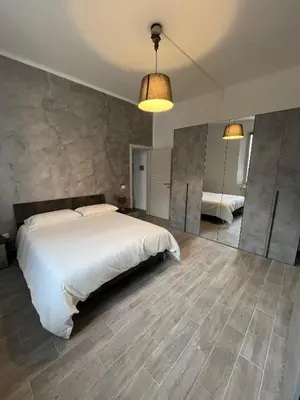Letto o letti in una camera di Suite Storchi - Apartment near downtown