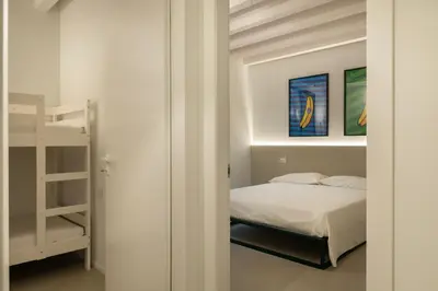 Letto o letti in una camera di Molly Apartments