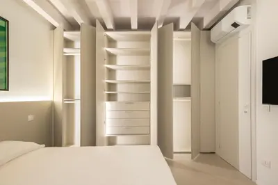 Letto o letti in una camera di Molly Apartments