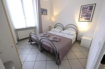 Letto o letti in una camera di Secret Garden by PortofinoVacanze