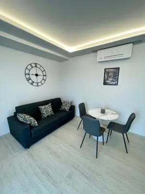 Area soggiorno di VITA Residence