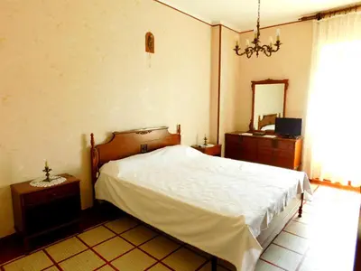 Letto o letti in una camera di Vicino alla spiaggia
