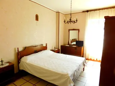 Letto o letti in una camera di Vicino alla spiaggia