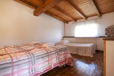Letto o letti in una camera di Da Rosy