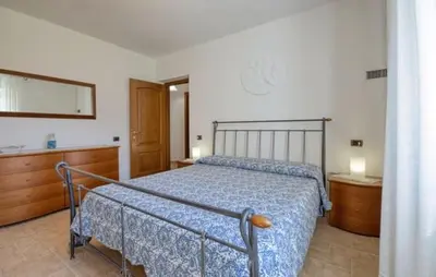 Letto o letti in una camera di Casa L'uliveto