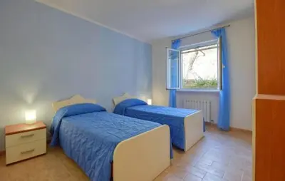 Letto o letti in una camera di Casa L'uliveto