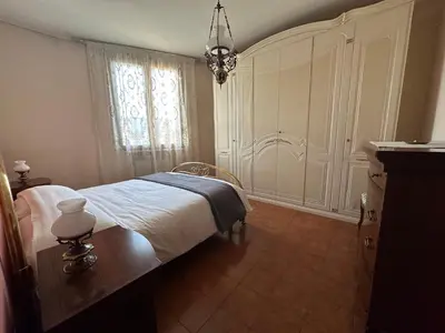 Letto o letti in una camera di Residenza d'autore a Reggio Emilia