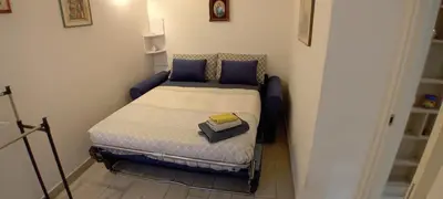 Letto o letti in una camera di Casa di Annalisa