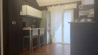 Cucina o angolo cottura di Attico con terrazza fronte mare a Cavi di Lavagna