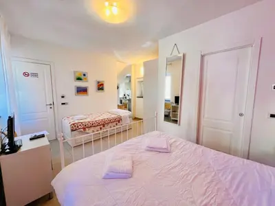 Letto o letti in una camera di Affittacamere Le Caravelle