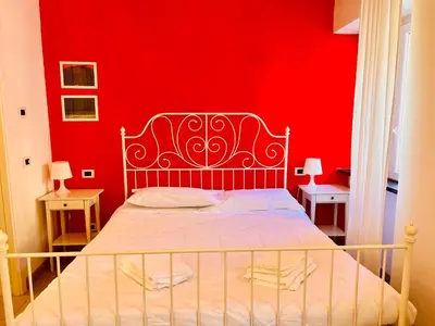 Letto o letti in una camera di Affittacamere Le Caravelle
